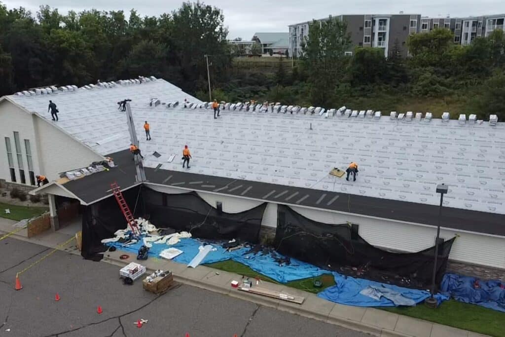 team on church roof