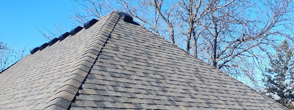 Top of the roof with Owens Corning Duration Shingles and Dura Ridge Ridge cap in the color of Peppercorn