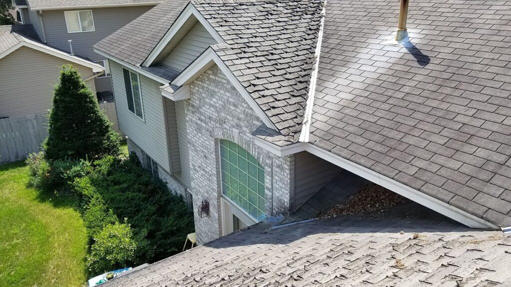 old roof with deterioration and curling