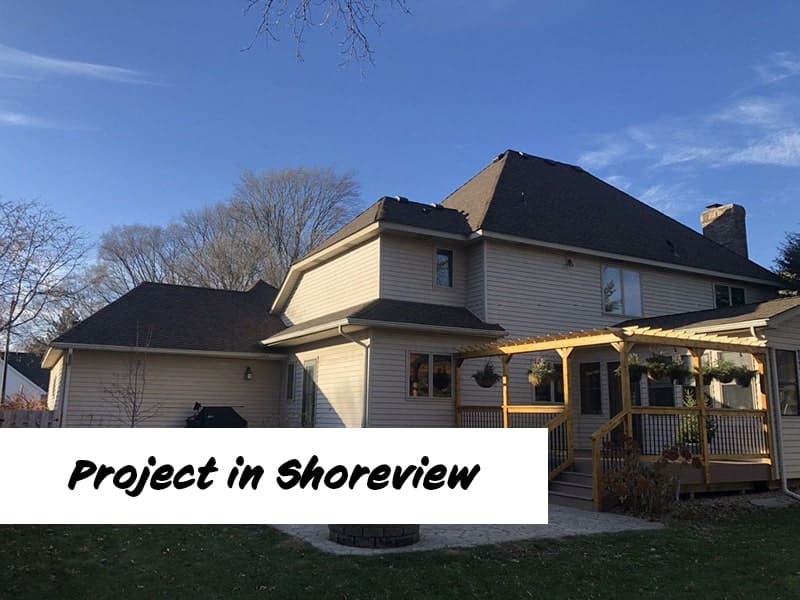 backyard view of finalized roof project in shoreview