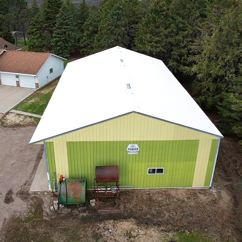 roof coating on metal outbuilding