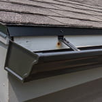 old gutter pulling away from the house