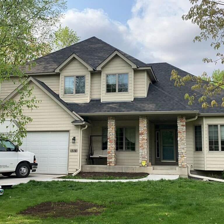 new roof and gutters on crown drive minnetonka home