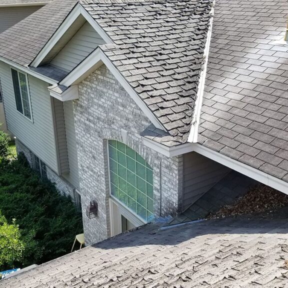 old roof with deterioration and curling